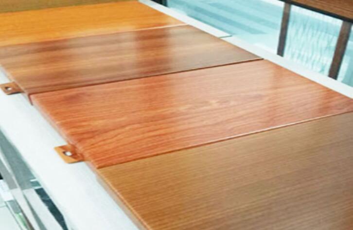 Wood grain aluminum veneer